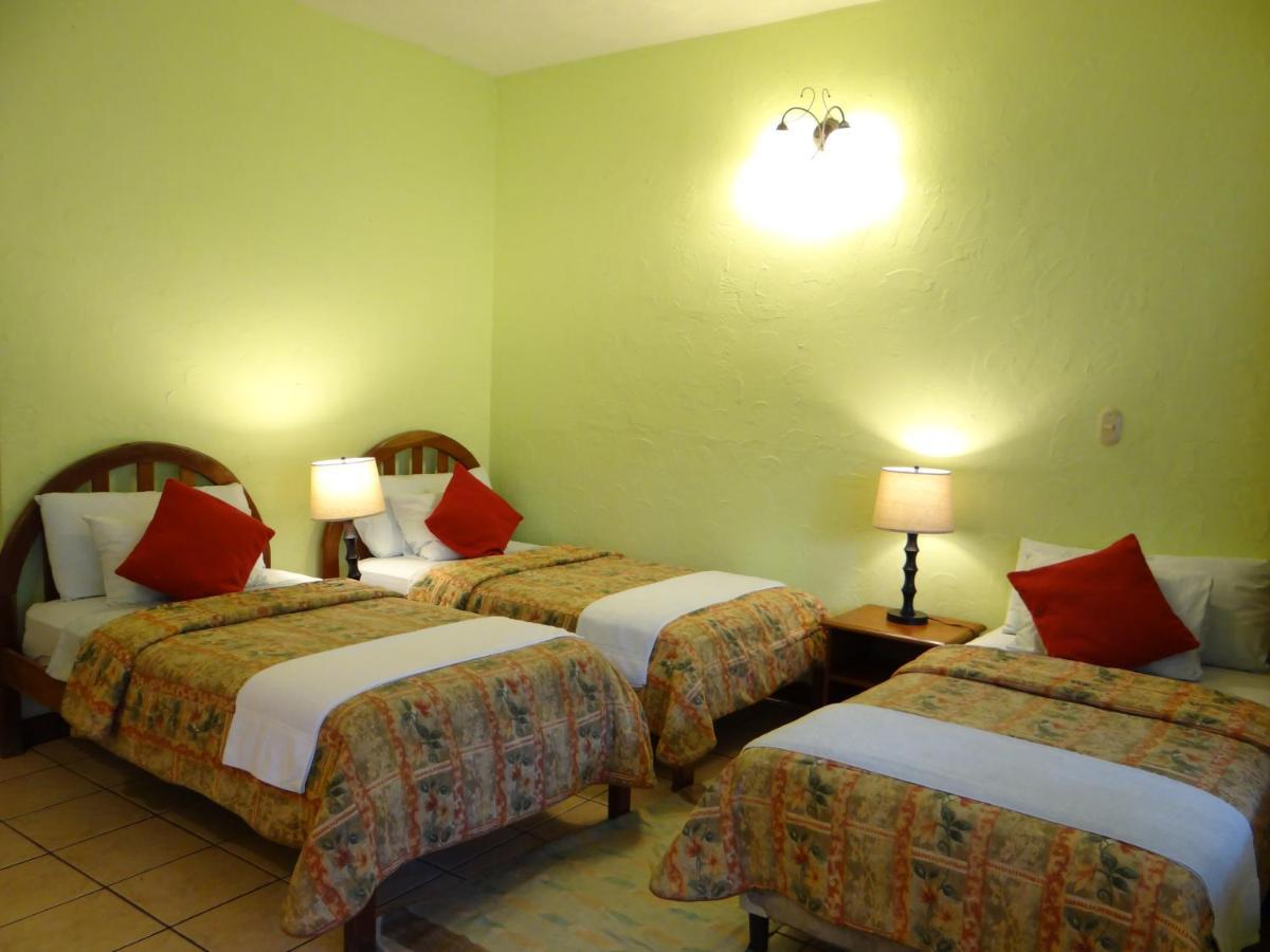 Hotel Jaguar Inn Tikal Extérieur photo